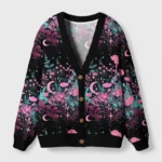 Front view of the moonlit garden cardigan sweater featuring a vibrant celestial floral design in black and pink.