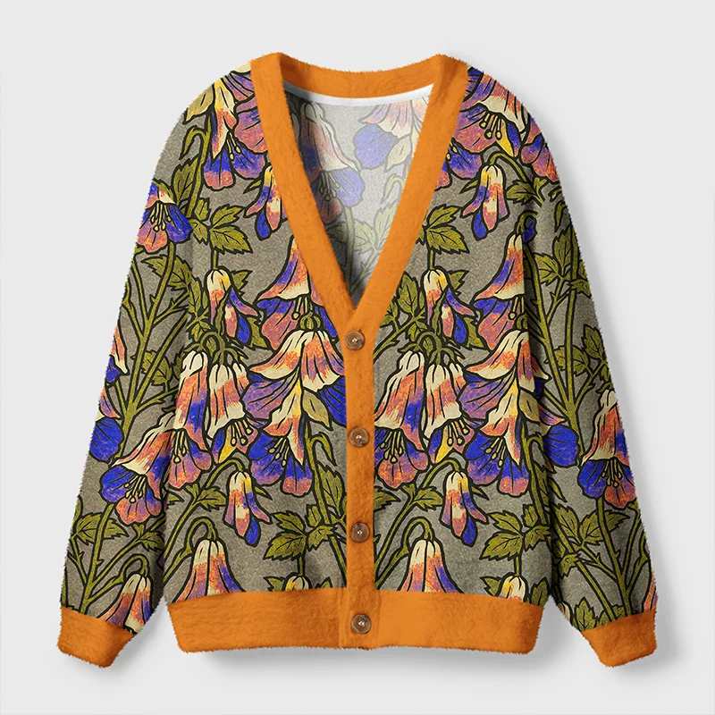 Lily of the Valley Cardigan Sweater Front view of the lily of the valley cardigan sweater featuring vibrant floral design and orange trim.