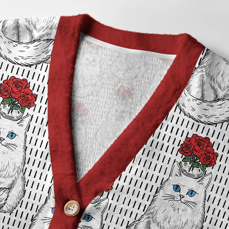 Vase Cat Cardigan Sweater | Artistic Cat Design Close-up detail of the vase cat cardigan sweater's buttons and intricate cat design with floral accents.