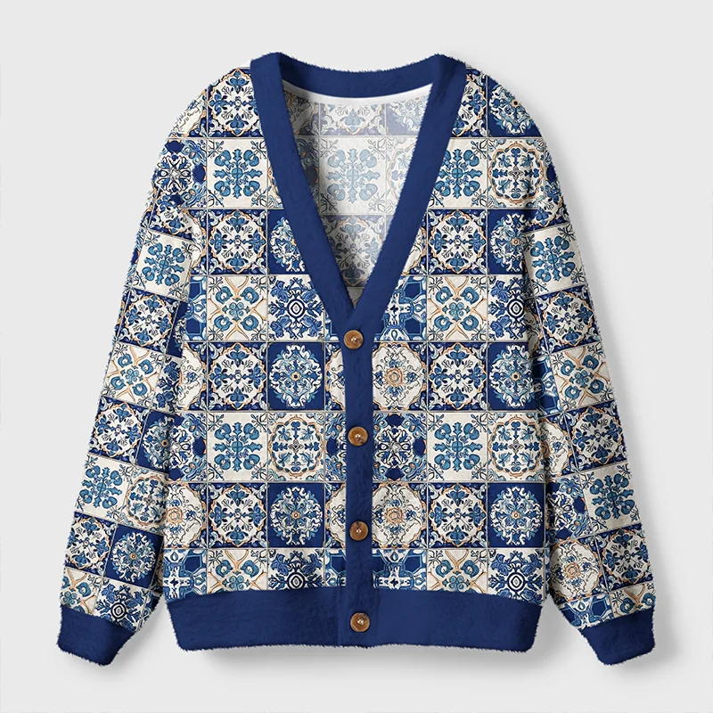 Mediterranean Mosaic Cardigan Sweater Front view of the Mediterranean mosaic cardigan sweater showcasing its blue geometric tile design and button details.