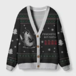 Front view of the black psychotic but festive cardigan featuring a penguin design and holiday patterns.