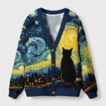 Front view of the black cat under the stars cardigan featuring a celestial cat design and deep navy accents.
