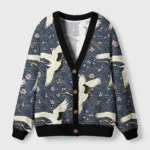 Front view of the white crane japan cardigan sweater featuring elegant crane designs on a navy background.