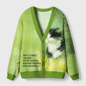 Front view of the humans are trained cat cardigan in vibrant green with a funny cat design and playful text.