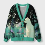 Front view of the whimsical night light little friend cardigan, featuring a cat and vibrant floral designs.