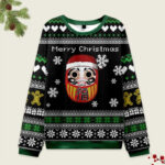 Front view of the daruma black Christmas ugly sweatshirt featuring a festive design with a Daruma doll and snowflakes.