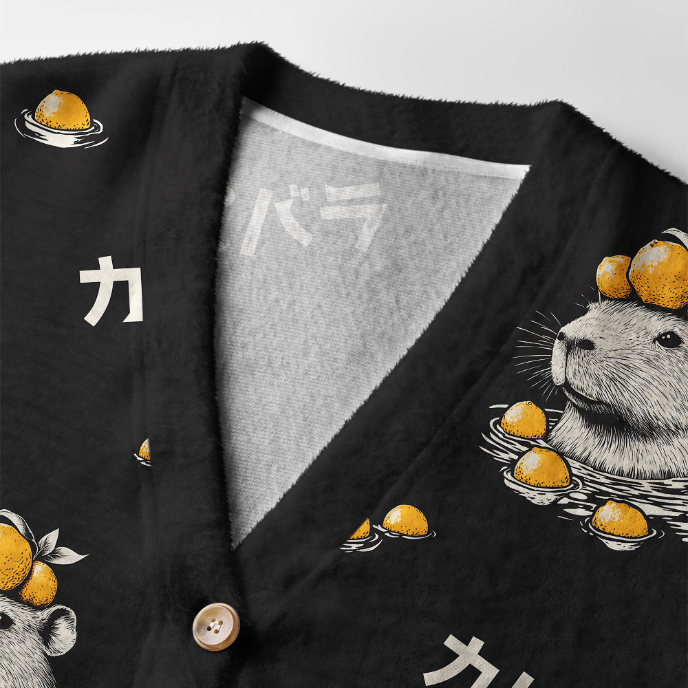 Capybara and Lemon Cardigan Sweater Close-up detail of the capybara and lemon cardigan sweater highlighting the unique fabric texture and fun print.
