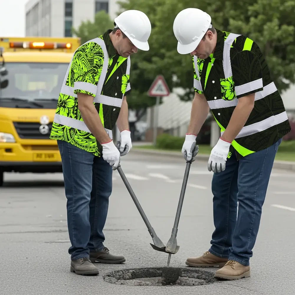 Polynesian Tribal Hi Vis Hawaiian Shirt Model wearing the polynesian tribal hi vis Hawaiian shirt at a construction site, demonstrating its practical use.
